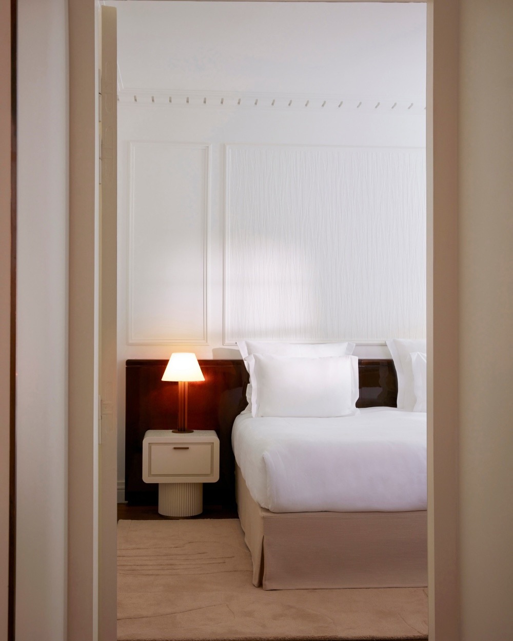 a peek through to the bedroom in the prestige suite from the hallways