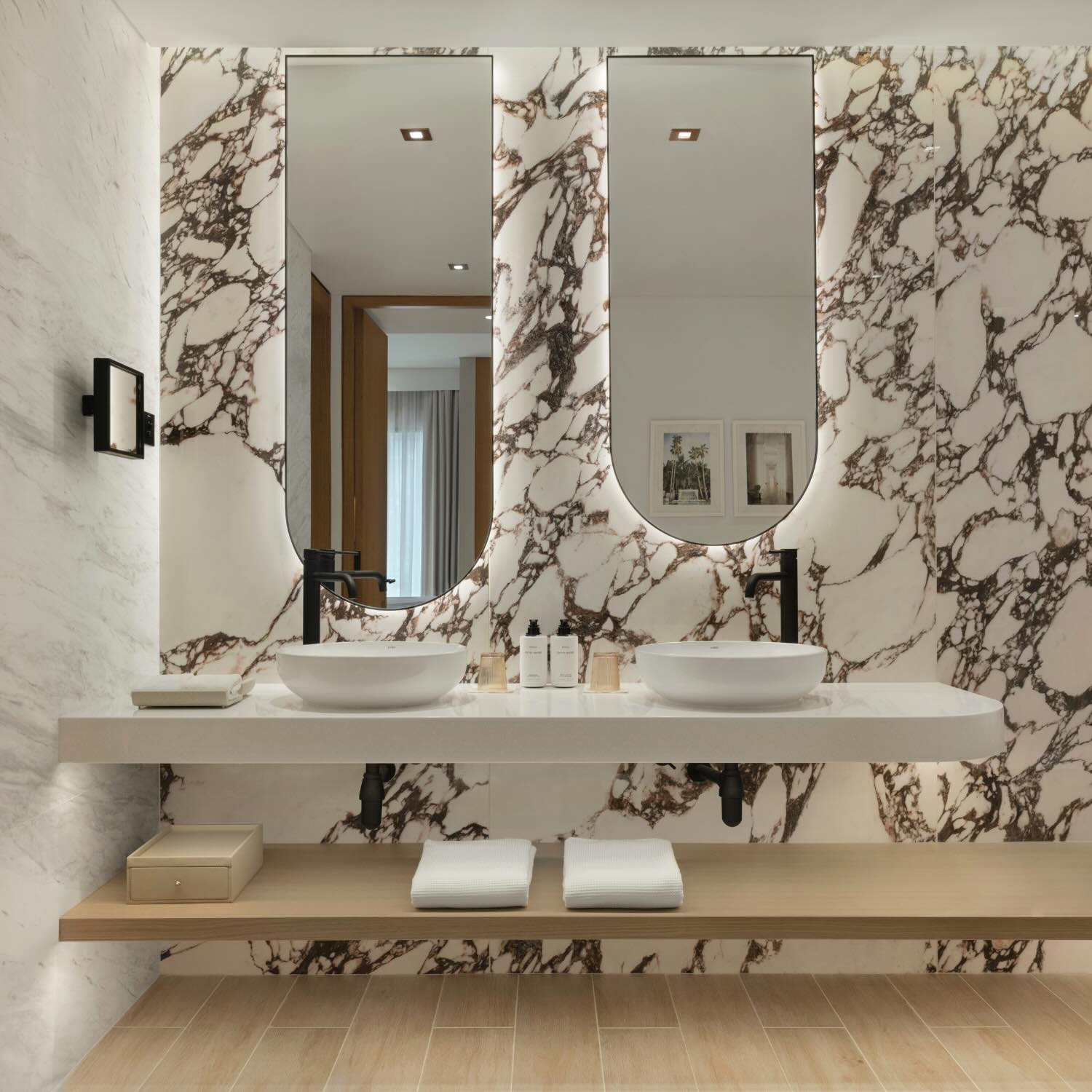 a closer look at the marble and vanity in the bathroom