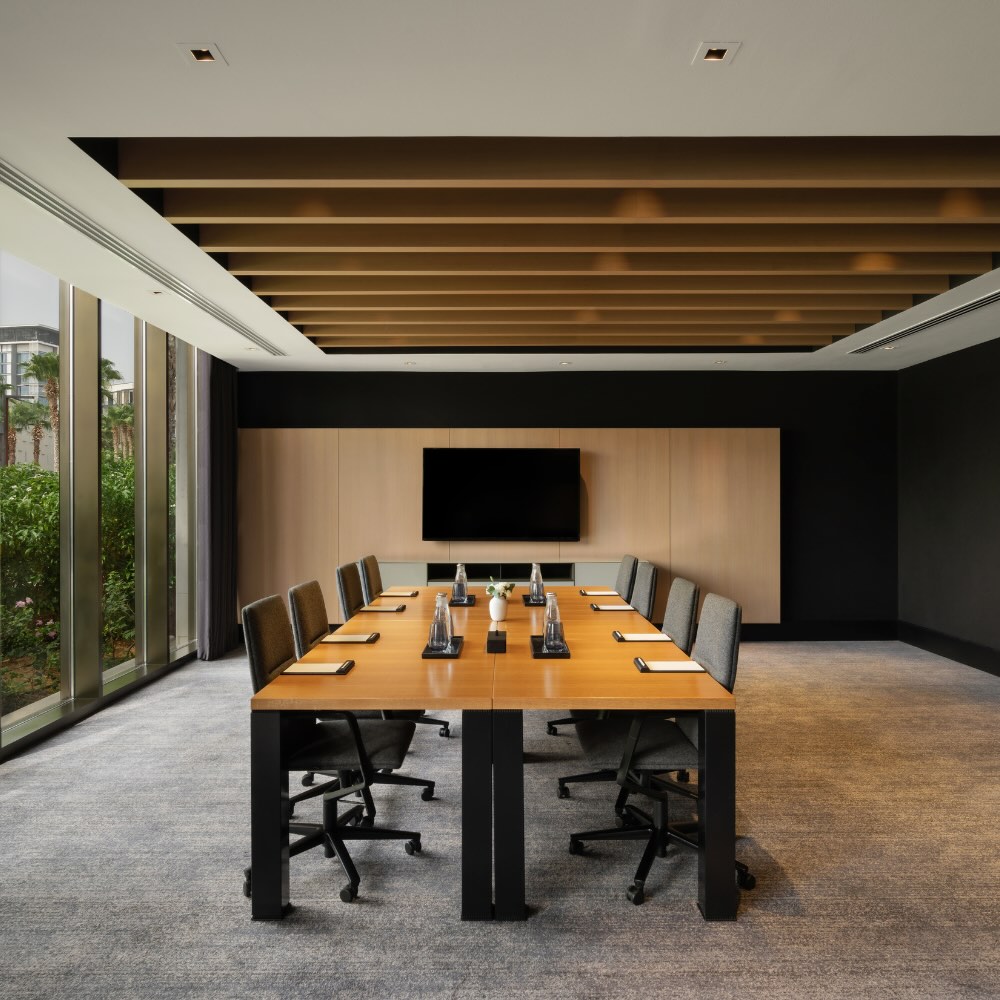 a meeting room set up in boardroom style