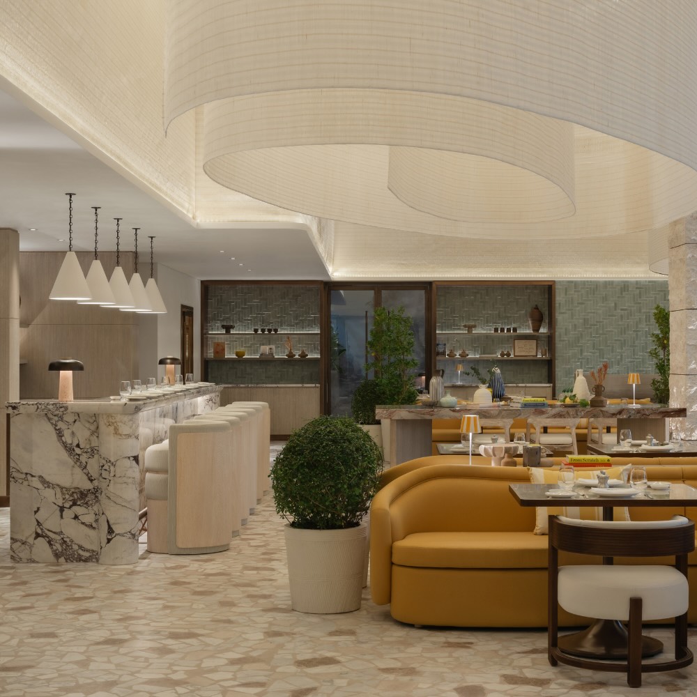 tutto passa at delano dubai, a light and airy restaurant with an intriguing modern chandelier