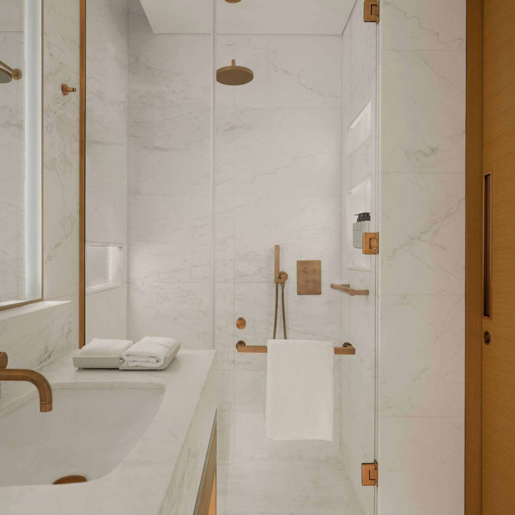 an elegant bathroom with a standing rainfall shower