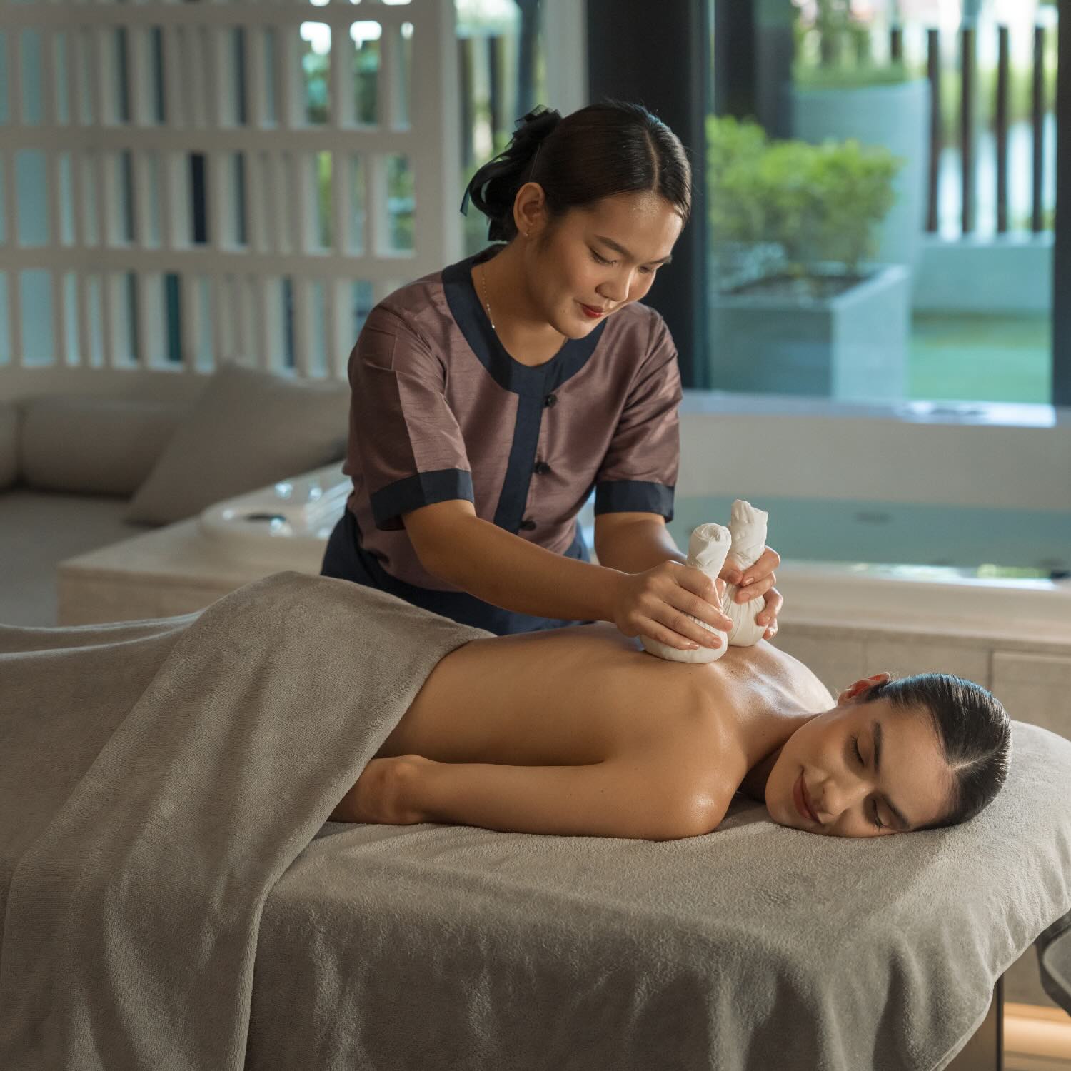 a woman enjoying a massage