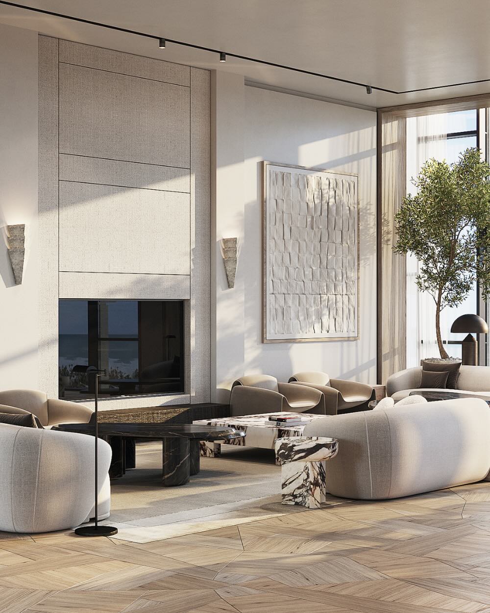 a lounge seating area with large art on the wall and floor to ceiling windows with natural light