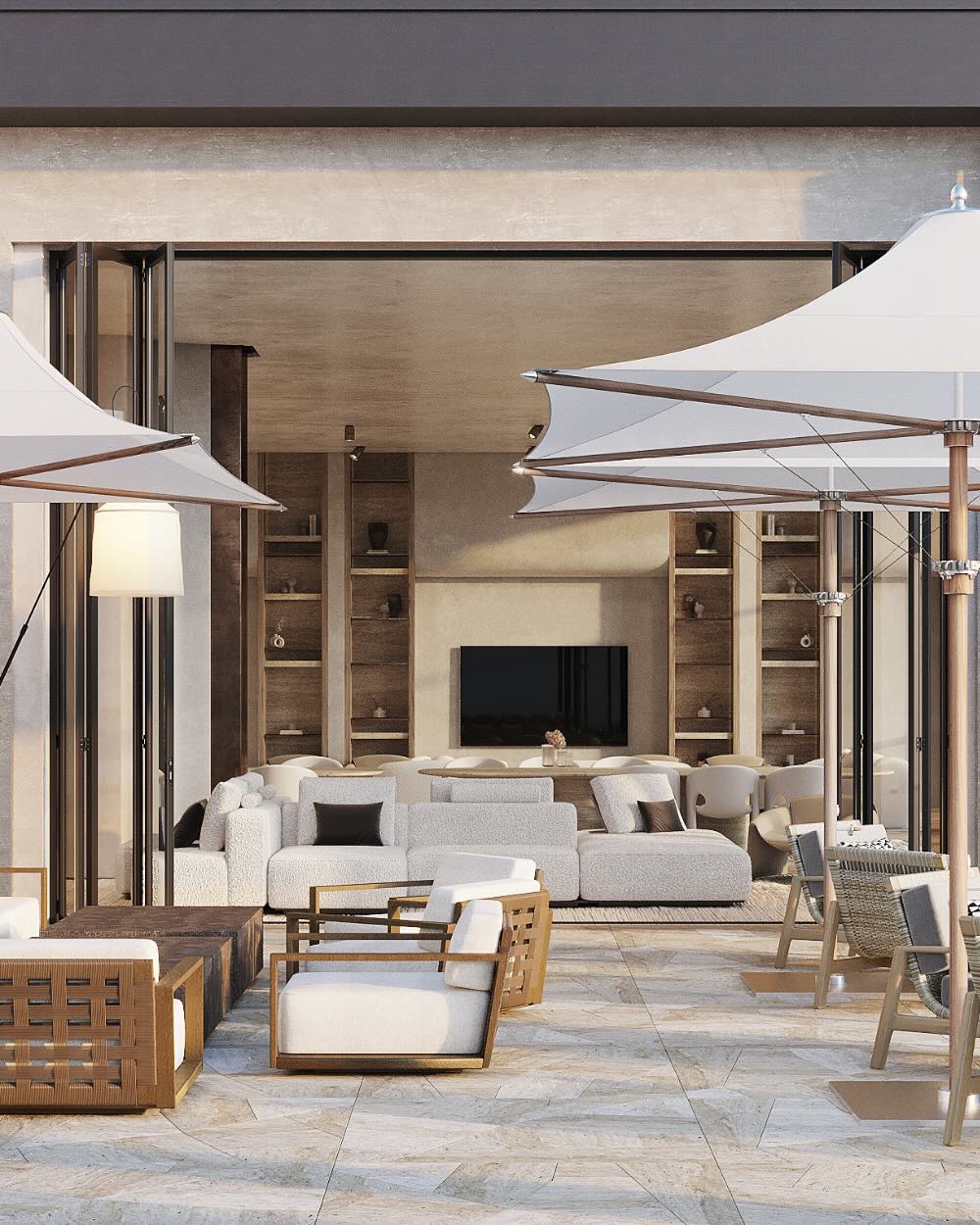 The lounge opens up to an outdoor terrace with seating