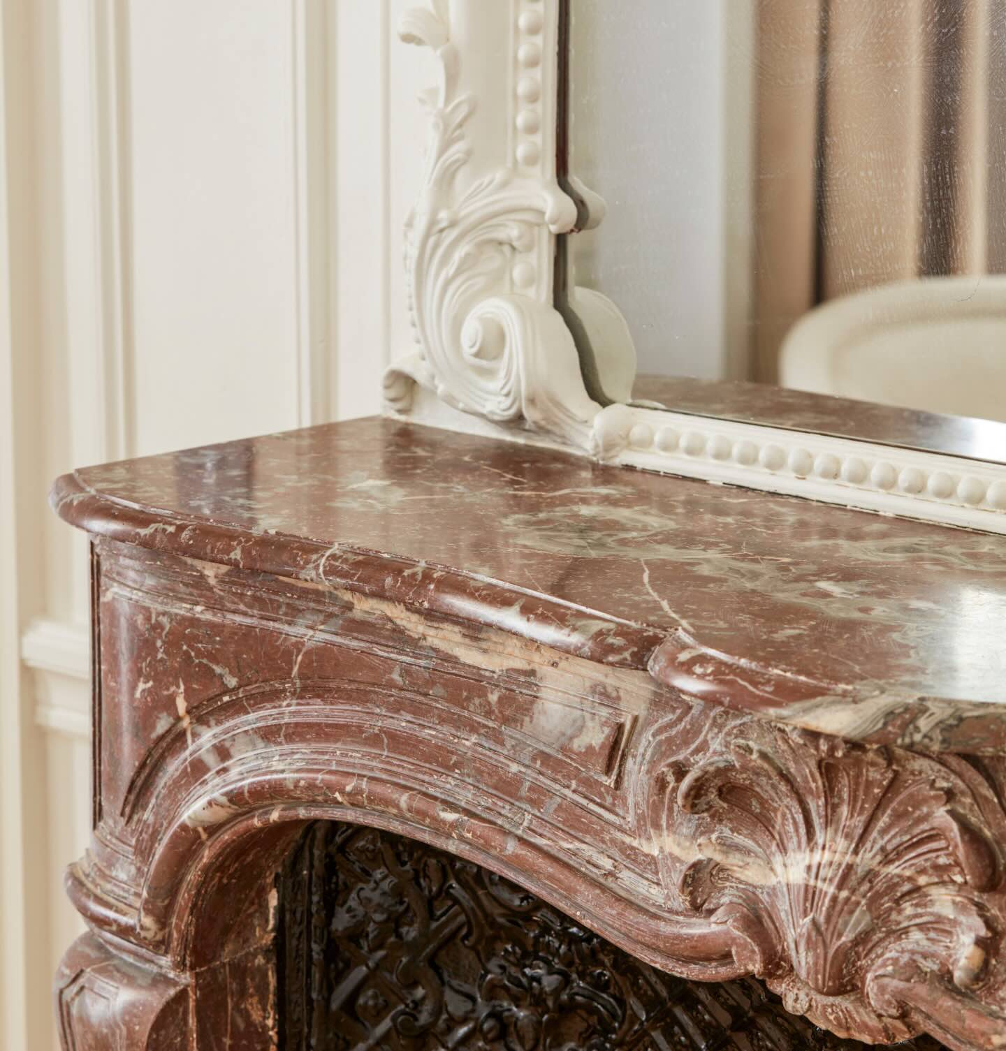 an ornate marble fireplace