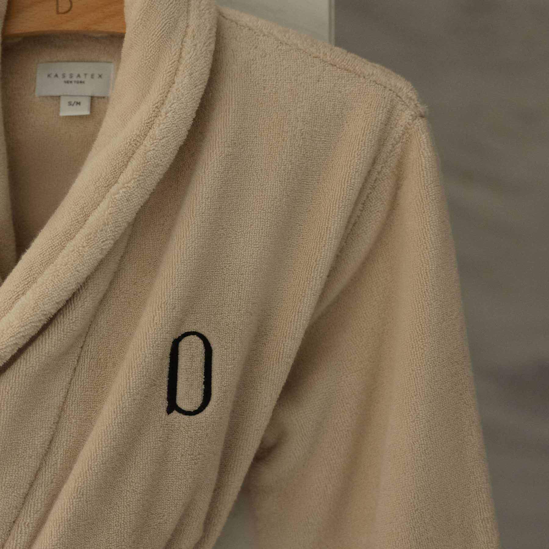 a luxurious and comfortable robe with the delano icon sewn in